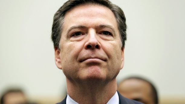 FBI Director James Comey arrives for a House Judiciary hearing on 
