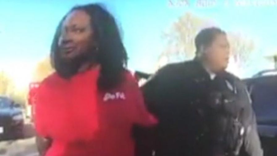 A police body camera captures the arrest of a woman who appeared intoxicated in her vehicle.