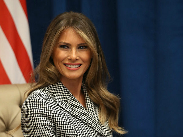 TORONTO, ON - SEPTEMBER 23: U.S. first lady Melania Trump smiles as she meets with Prince Harry for the first time while leading the USA team delegation ahead of the Invictus Games 2017 on September 23, 2017 in Toronto, Canada (Photo by Chris Jackson/Getty Images for the Invictus Games Foundation )