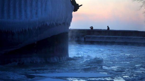 Steam rises from Lake Superior as the ship St. Clair comes to harbor during some of the coldest temps of the year, Sunday, Dec. 31, 2017, at Canal Park in Duluth, Minn. The St. Clair is a self-unloader built in 1976 at Sturgeon Bay, Wis., and is 770 feet long and has 26 hatches that open into 5 cargo holds, providing a load capacity of 45,000 tons. (David Joles/Star Tribune via AP)