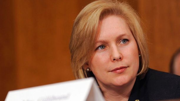 FILE - In this Jan. 28, 2009, file photo, and with a temporary name card in front of her, New York's newest Sen. Kirsten Gillibrand, D-N.Y., listens to testimony on Capitol Hill in Washington. Gillibrand got a fight she wants after President Donald Trump attacked her in a provocative tweet that claimed sheâd begged him for campaign contributions and would âdo anythingâ for them. Gillibrand, is up for re-election next year and is considered a possible presidential contender in 2020. Sheâs been a leading voice in the national debate over how to confront sexual assault and harassment. (AP Photo/Susan Walsh, File)