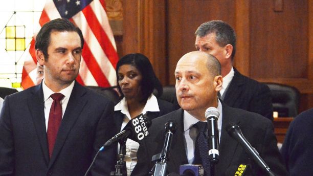 Jersey City Police Chief Michael Kelly speaks at a press conference Friday morning, Jan. 5, 2018, in Jersey City, N.J., regarding Jersey City Police Lt. Chris Robateau who was was killed on the New Jersey Turnpike early Friday morning.  Robateau, 49, of Carteret, exited his car to help a motorist on his way to work and was struck by a vehicle. At left is Mayor Steve Fulop. (Michaelangelo Conte/The Jersey Journal via AP)