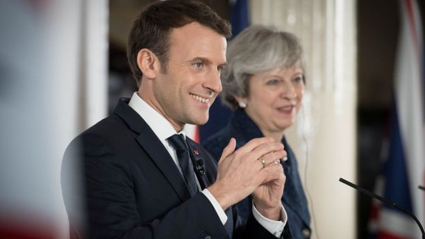 Britain's Prime Minister Theresa May and France's President Emmanuel Macron hold a news conference at the Royal Military Academy in Sandhurst, Britain,  January 18, 2018. REUTERS/Stefan Rousseau/Pool - RC1162A5B140