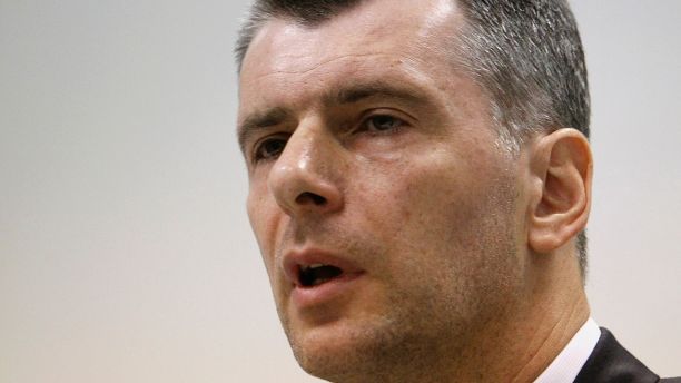 Russian billionaire Mikhail Prokhorov speaks during a news conference, dedicated to addressing issues in the upcoming Moscow mayoral elections, in Moscow June 13, 2013. The Russian capital's first direct mayoral elections in a decade will be held on September 8. REUTERS/Sergei Karpukhin (RUSSIA - Tags: BUSINESS POLITICS ELECTIONS HEADSHOT) - GM1E96D1DLS01