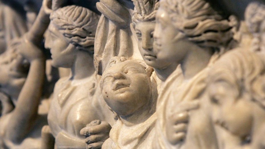 Cherubs adorn the side of a Roman bath urn which is on display during a preview of the new Greek and Roman Galleries at the Met in New York, April 16, 2007.