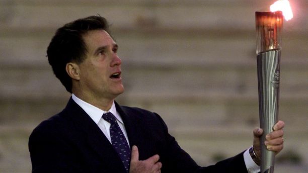 President of the organising committee of Salt Lake Winter Olympic Games
Mitt Romney sings U.S. national anthem as he raises an Olympic torch
December 3, 2001, during a handing-over ceremony in Athens' Panathenean
stadium. The flame will travel 13,500 miles across the United States in
65 days and will arrive in Salt Lake's Olympic stadium on February 8,
2001. REUTERS/Yiorgos Karahalis

YK/GB - RP2DRIQSROAB