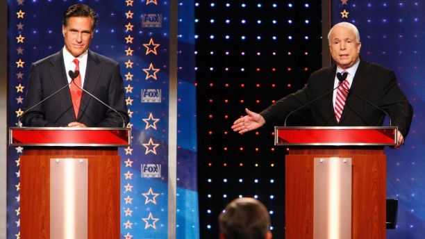 Republican presidential candidates former Massachusetts Governor Mitt Romney (L) and U.S. Sen. John McCain (R-AZ) take part during Fox News Channel Republican Presidential debate at the University of New Hampshire in Durham, New Hampshire, September 5, 2007.   REUTERS/Brian Snyder (UNITED STATES) - GM1DWBZUENAA