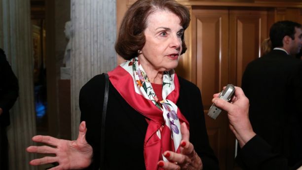 Sen. Dianne Feinstein, D-Calif., speaks with a reporter on Capitol Hill, Tuesday, Dec. 19, 2017 in Washington. (AP Photo/Alex Brandon)