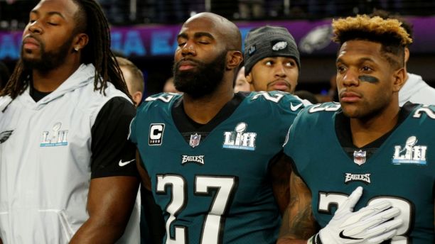 NFL Football - Philadelphia Eagles v New England Patriots - Super Bowl LII - U.S. Bank Stadium, Minneapolis, Minnesota, U.S. - February 4, 2018 Philadelphia EaglesÕ Rodney McLeod and Malcolm Jenkins during the national anthems before the game REUTERS/Kevin Lamarque - RC121AA87880
