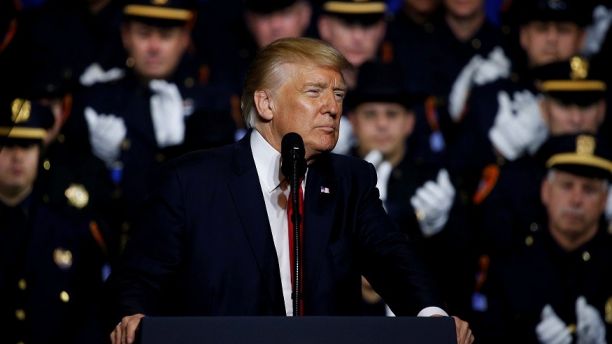 U.S. President Donald Trump delivers remarks about his proposed U.S. government effort against the street gang Mara Salvatrucha, or MS-13, to a gathering of federal, state and local law enforcement officials in Brentwood, New York, U.S. July 28, 2017. REUTERS/Jonathan Ernst - RC12560ABC30