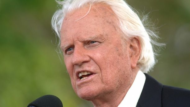FILE - In this June 26, 2005 file photo, the Rev. Billy Graham speaks on stage on the third and last day of his farewell American revival in the Queens borough of New York.  A spokesman said on Graham has died at his home in North Carolina at age 99. (AP Photo/Henny Ray Abrams)