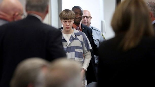 Dylann Roof is escorted into the court room at the Charleston County Judicial Center to enter his guilty plea on murder charges in state court for the 2015 shooting massacre at a historic black church, in Charleston, South Carolina, April 10, 2017. REUTERS/Grace Beahm/Pool - RTX34ZJW