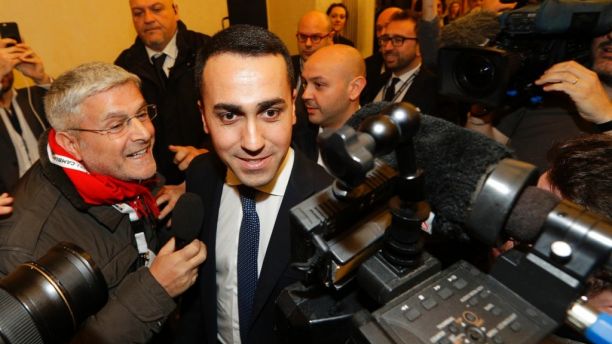 5-Stars Movement's leader Luigi Di Maio arrives for a press conference on the preliminary election results, in Rome, Monday, March 5, 2018. With the anti-establishment 5-Stars the highest vote-getter of any single party, the results confirmed the defeat of the two main political forces that have dominated Italian politics for decades â Forza Italia and the center-left Democrats â and the surging of populist and right-wing, euroskeptic forces that have burst onto the European scene.  (AP Photo/Andrew Medichini)