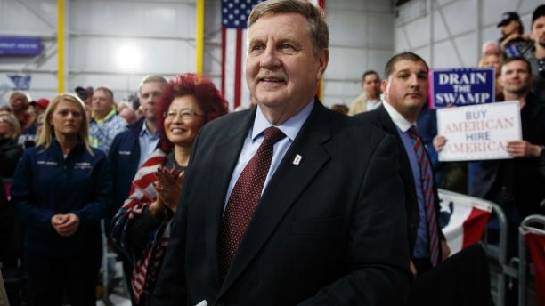 Republican Rick Saccone looks to the stage and President Donald Trump at a campaign rally at Atlantic Aviation in Moon Township, Pa., Saturday, March 10, 2018. Saccone is running against Democrat Conor Lamb in a special election being held on March 13 for the PA 18th Congressional District vacated by Republican Tim Murphy. (AP Photo/Carolyn Kaster)