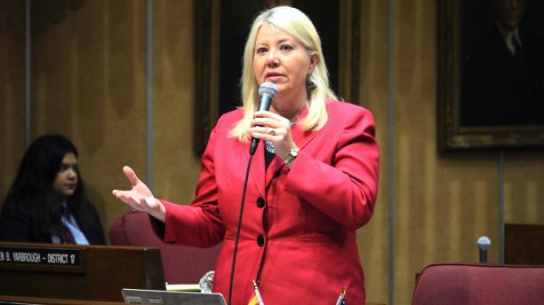 FILE - In this April 6, 2017 file photo, Arizona state Sen. Debbie Lesko speaks in the Senate chambers in Phoenix. Two former Republican Arizona lawmakers who are leading candidates to fill a vacant U.S. House seat are embroiled in controversy as Tuesday's special primary election looms. Former state Sen. Debbie Lesko is under fire for transferring $50,000 from her old state Senate campaign fund to an independent group backing her congressional election bid. Former state Sen. Steve Montenegro reportedly received racy text messages from a Senate staffer who isn't his wife. (AP Photo/Bob Christie, File)
