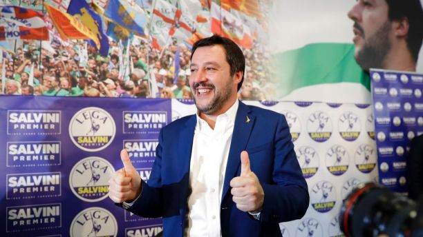Right-wing, anti-immigrant and euroskeptic League's Matteo Salvini gives the thumbs up at the end of a press conference on the preliminary election results, in Milan, Monday, March 5, 2018. The League jumped from 4 percent of the vote five years ago to nearly 18 percent in Sunday's vote, ahead of Forza Italia, which had nearly 14 percent. (AP Photo/Luca Bruno)