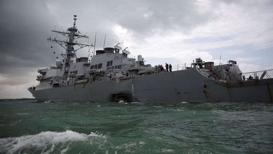 The U.S. Navy guided-missile destroyer USS John S. McCain is seen after a collision, in Singapore waters, Aug. 21, 2017.